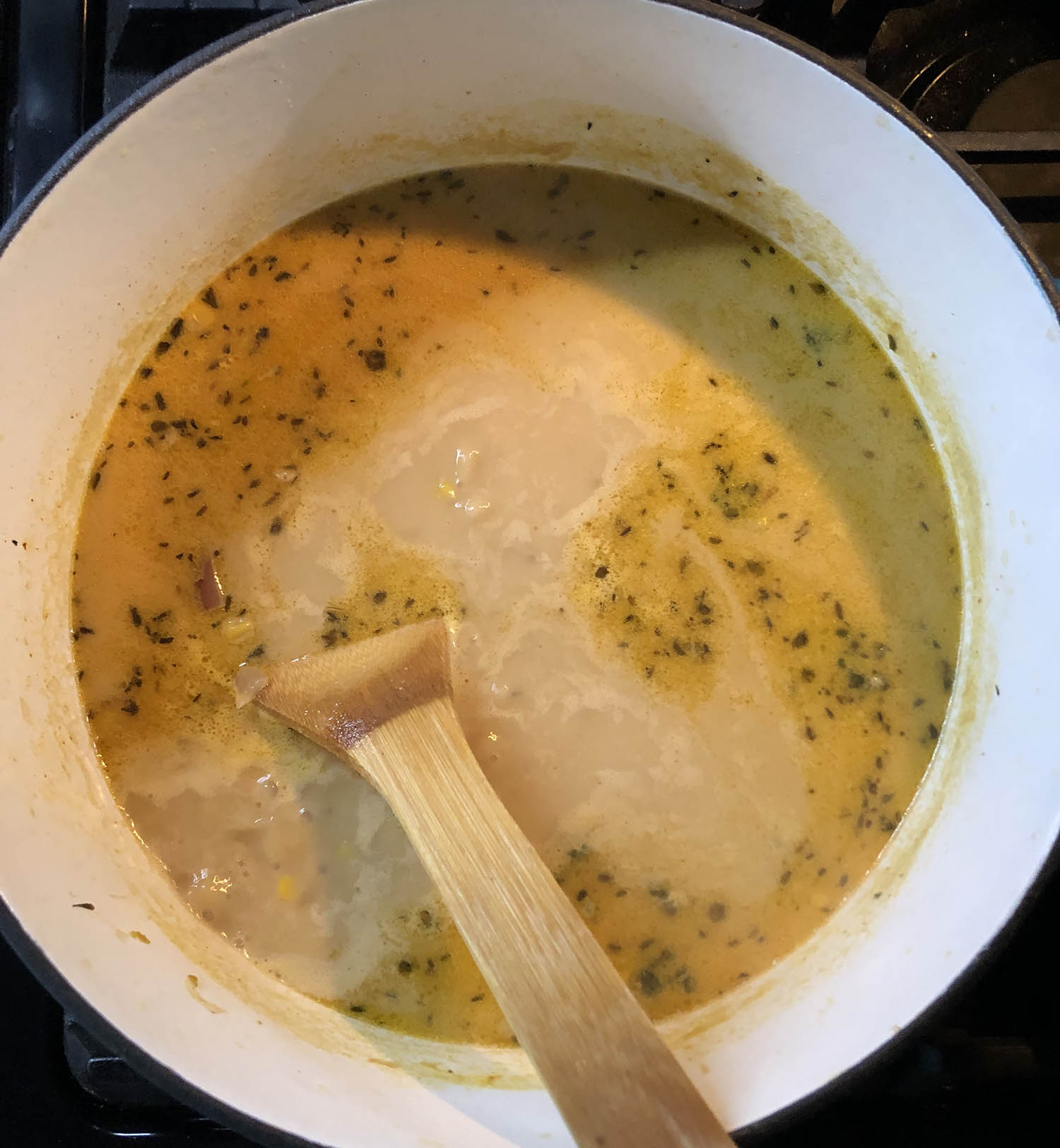 stirring cream into a corn chowder