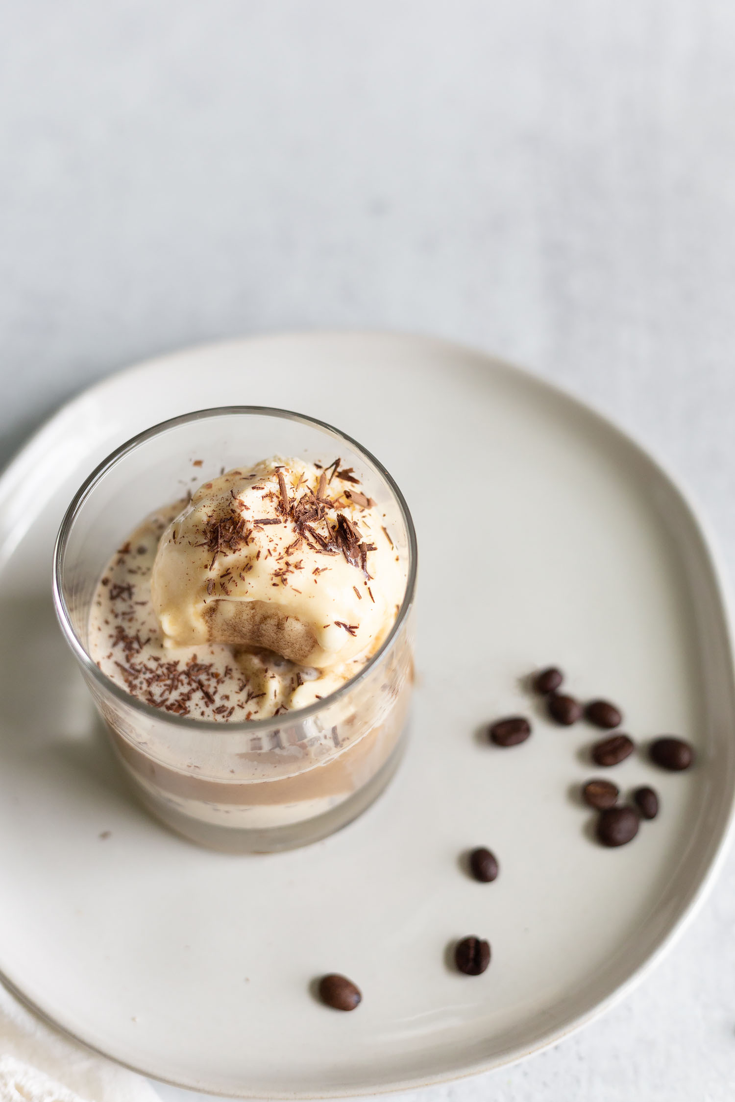 Italian affogato with coffee and ice cream topped with chocolate shavings