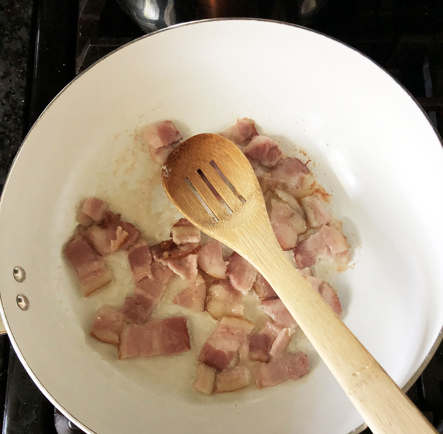 bacon cooking in a pan