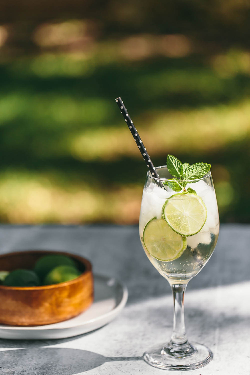 hugo austrian spritz on a table with limes