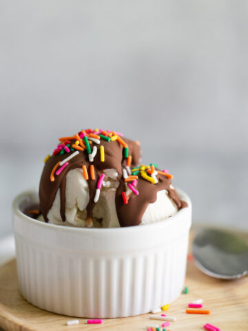 ice cream in a bowl with magic shell and sprinkles