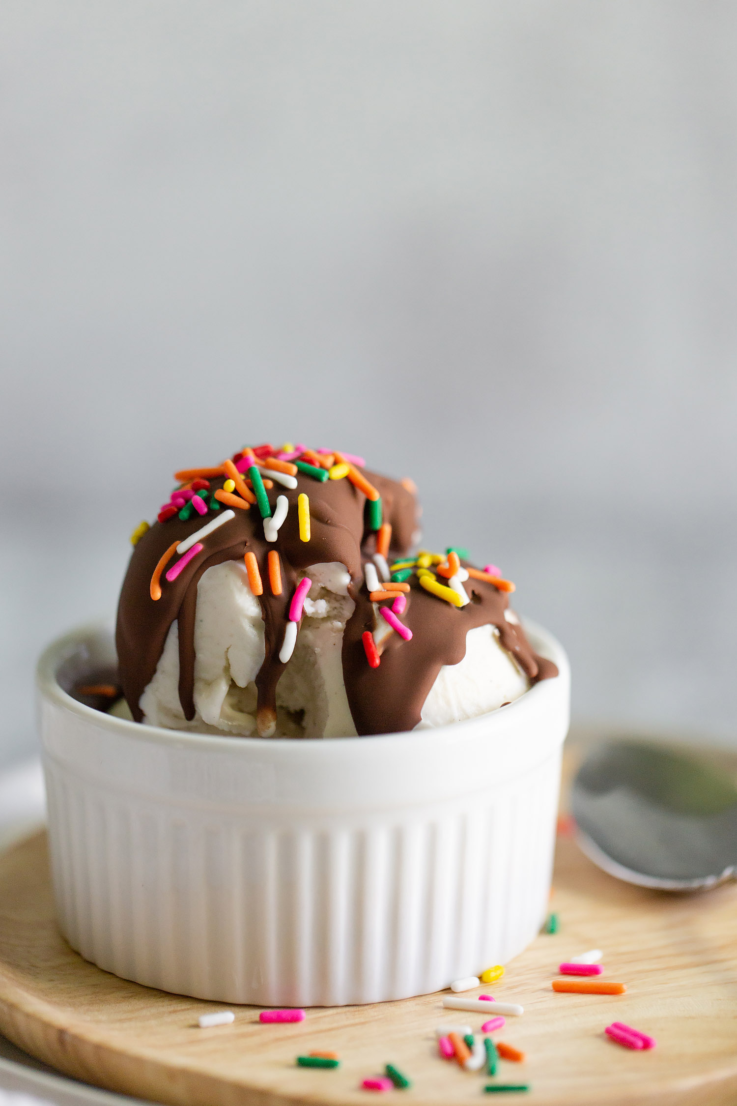 ice cream in a bowl with magic shell and sprinkles