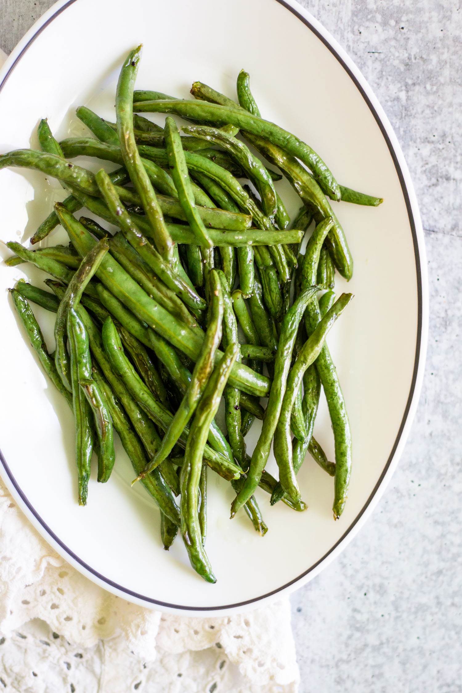 roasted green beans on a platter