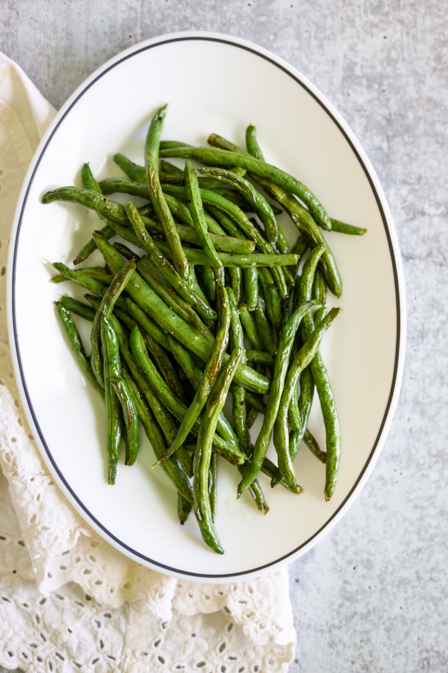 roasted green beans on a platter