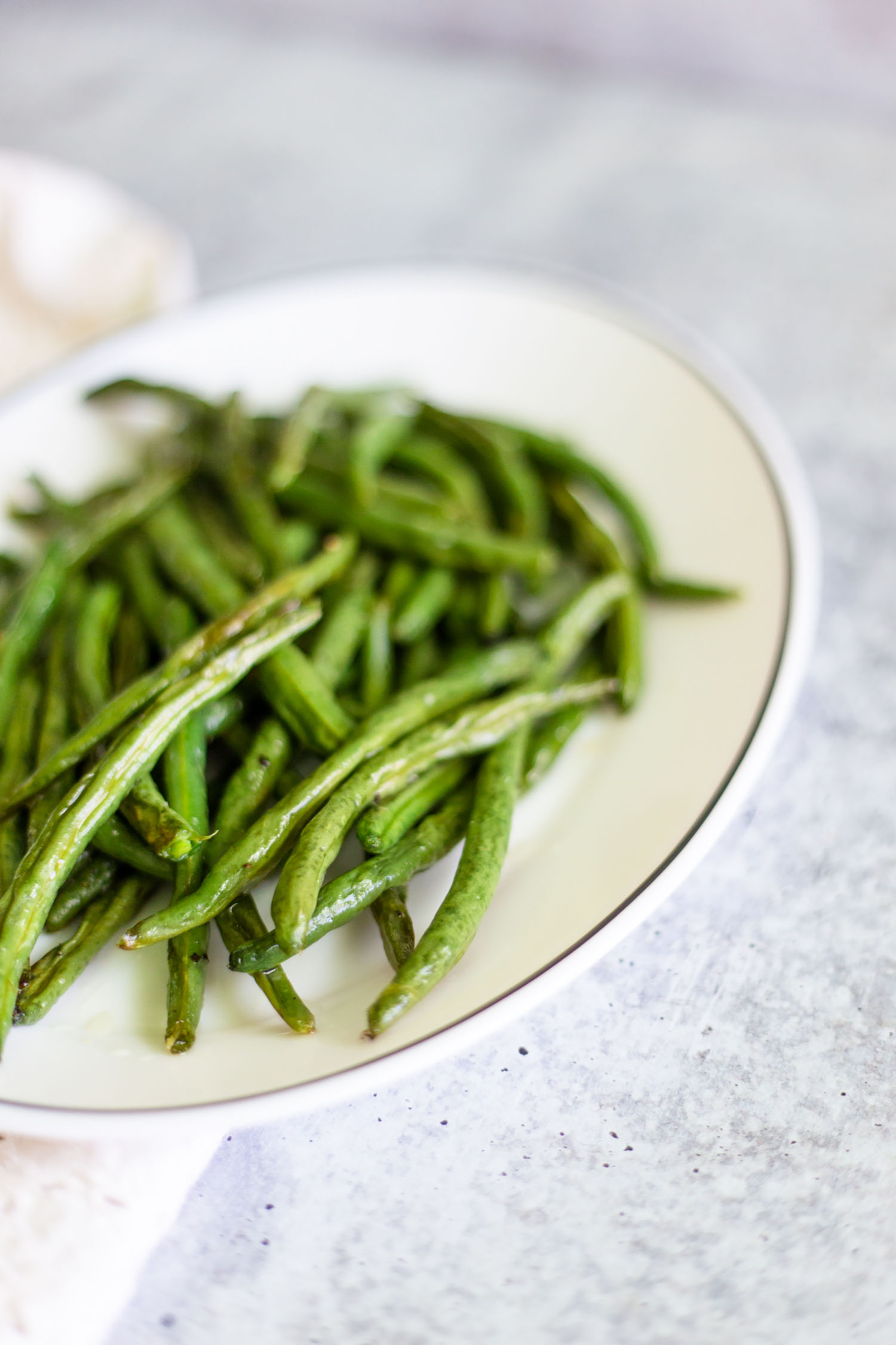 roasted green beans on a platter