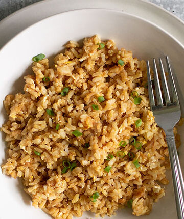 fried rice with egg and green onions - cropped photo