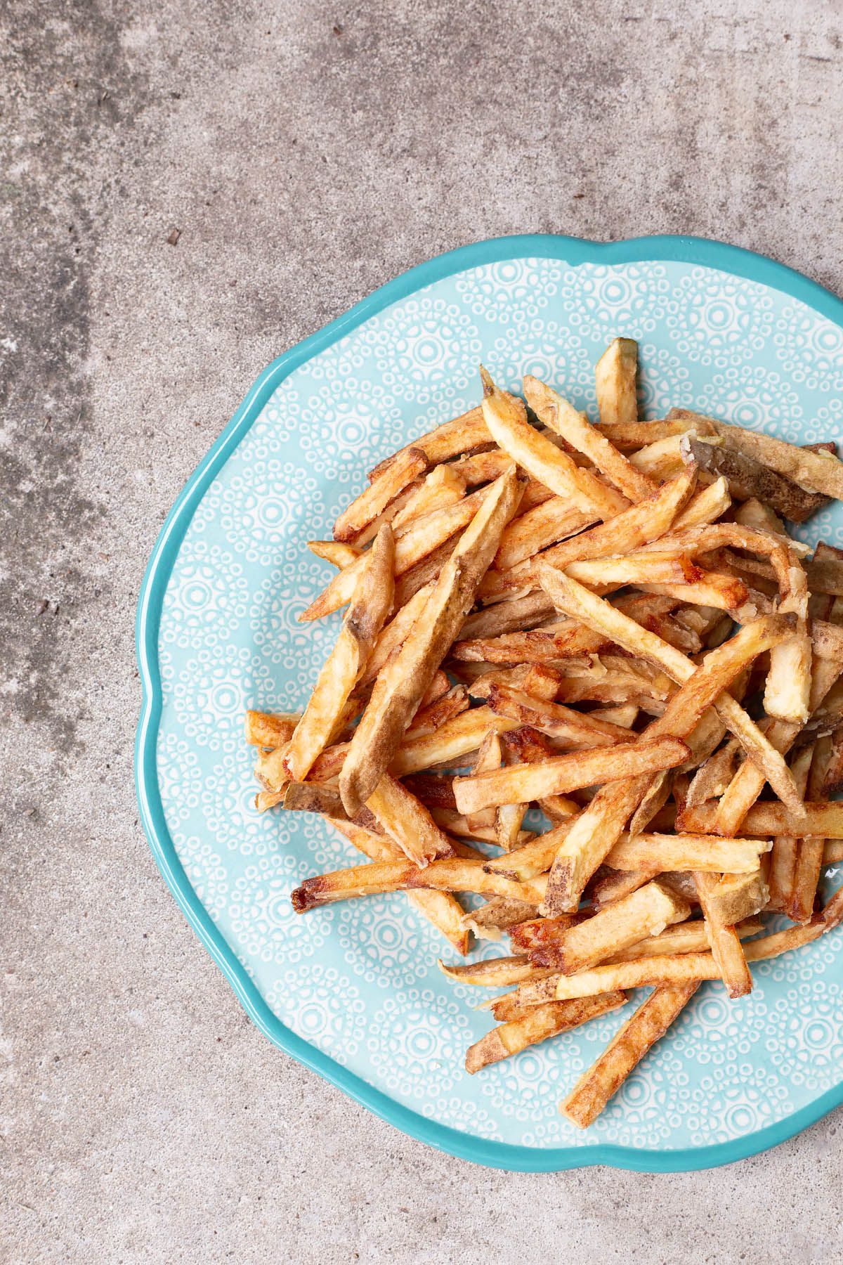 crispy french fries on a plate