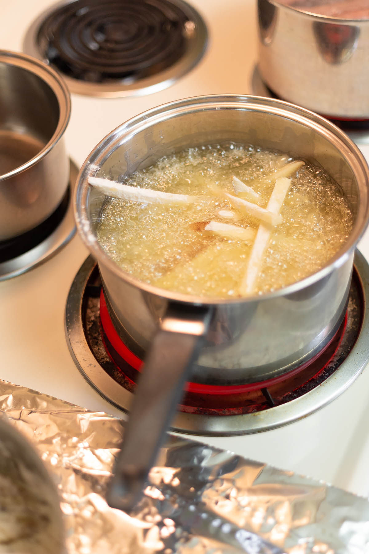 frying french fries on the stove