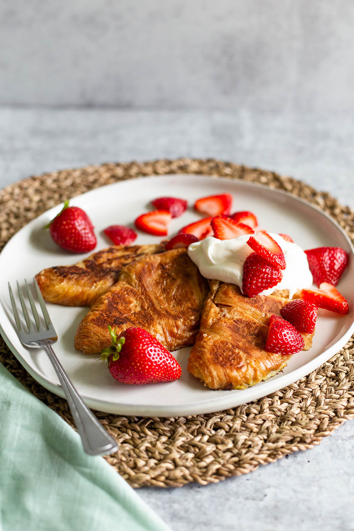 strawberry croissant french toast on a plate