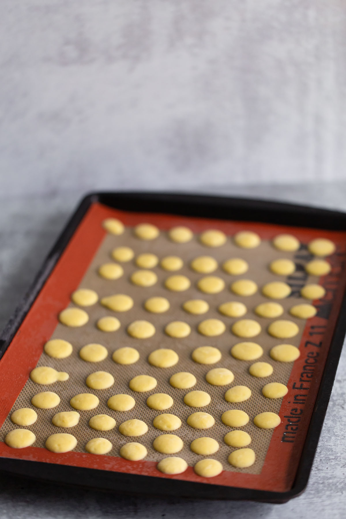 frozen yogurt bites on a cookie sheet