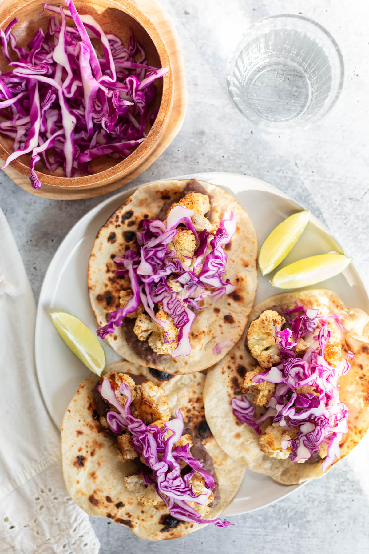 vegan cauliflower tacos with red cabbage on a plate