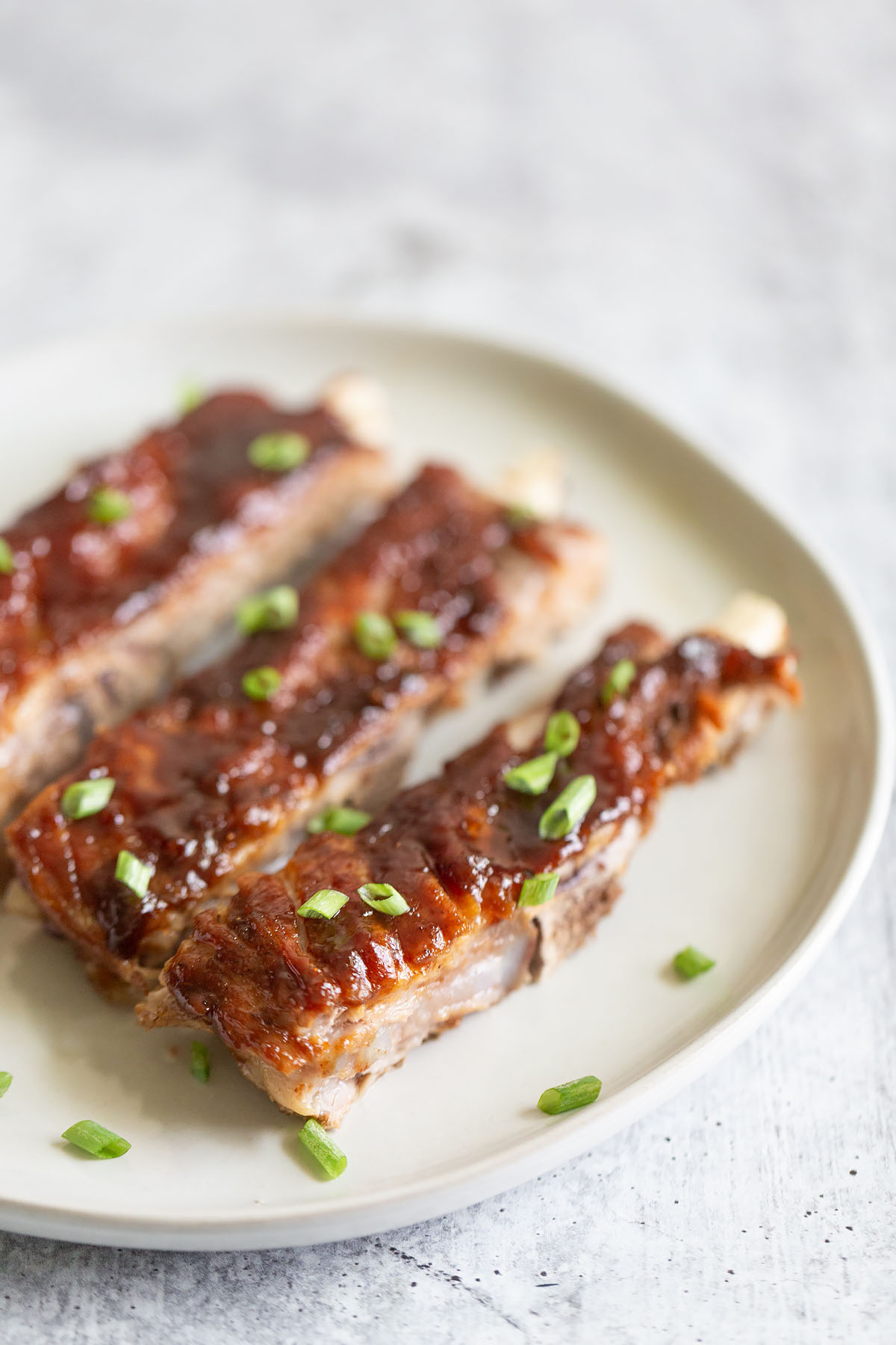 sliced hoisin ribs on a plate