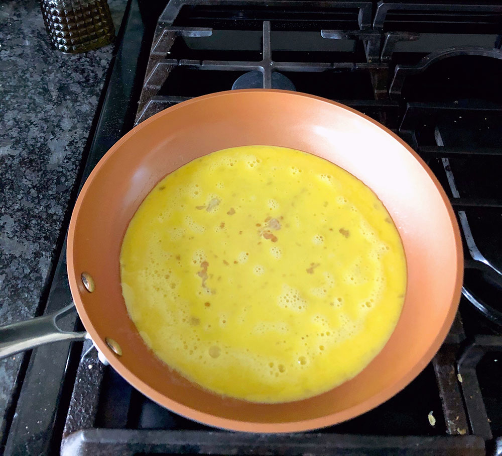 eggs cooking in a pan