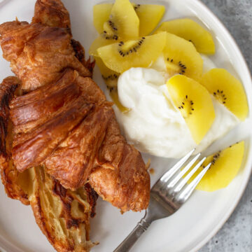 croissant with yogurt and kiwi from above