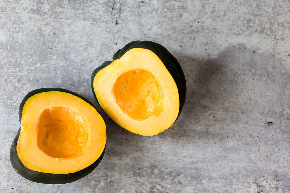 acorn squash with seeds scooped out