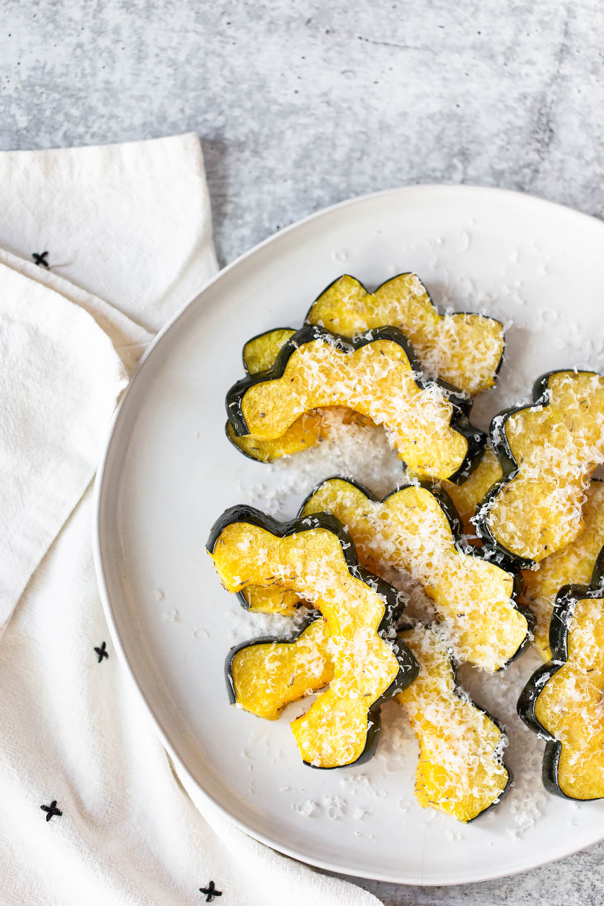 roasted acorn squash slices on a plate