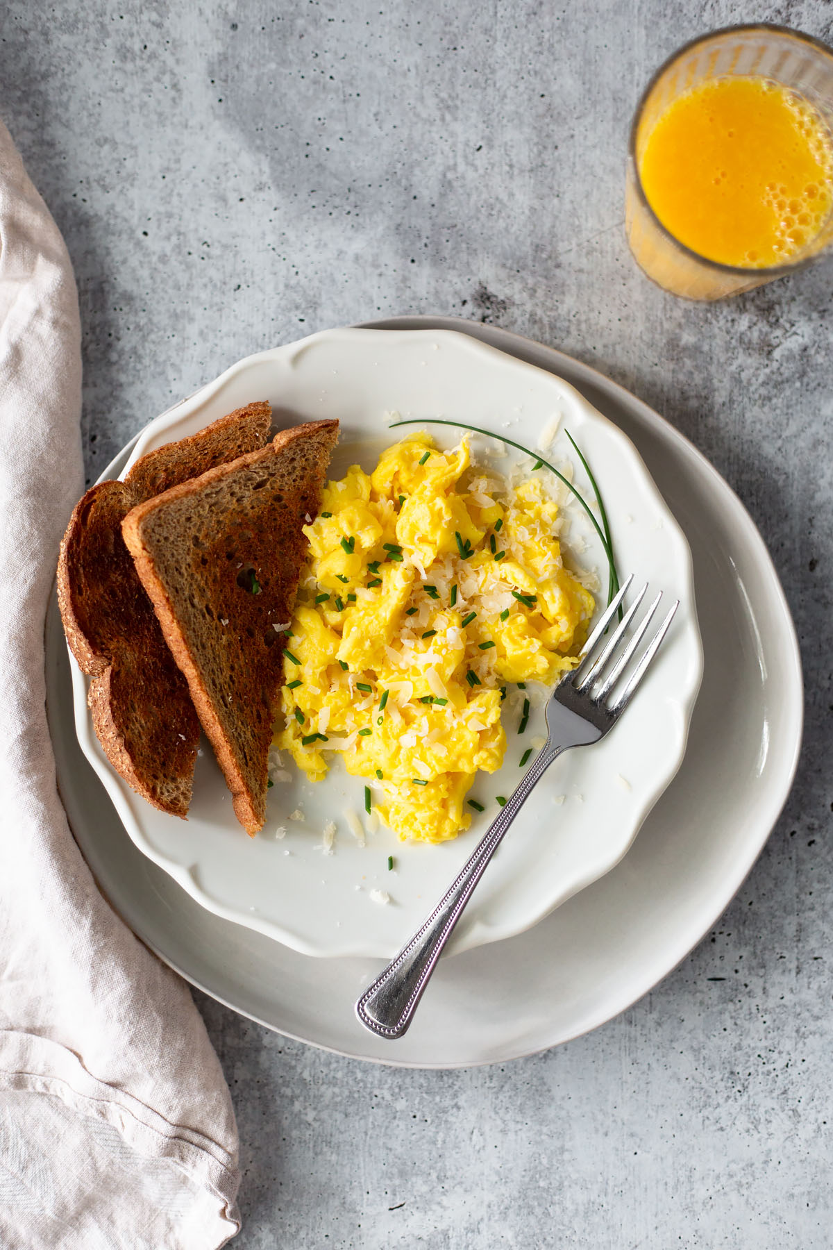 fluffy scrambled eggs with toast