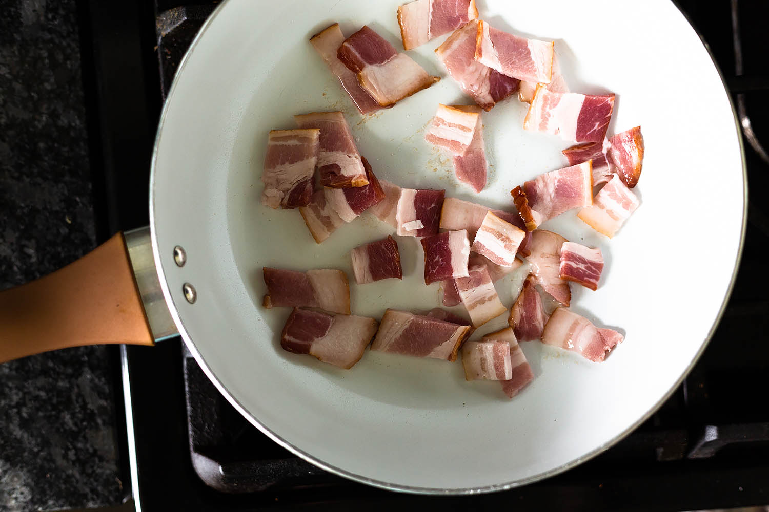 bacon cooking in a pan