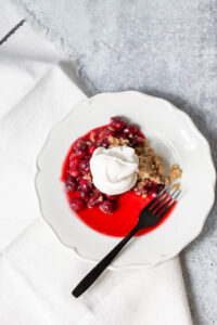 cranberry crumble topped with whipped cream