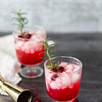 two cranberry mocktails in glasses