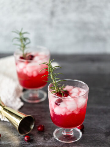two cranberry mocktails in glasses