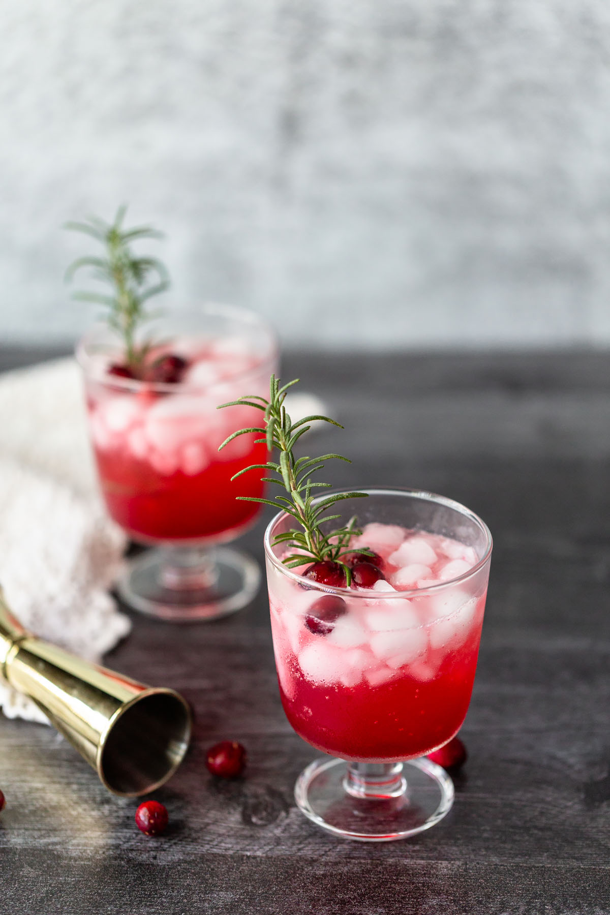 two cranberry mocktails in glasses