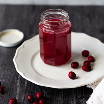 cranberry simple syrup in a jar