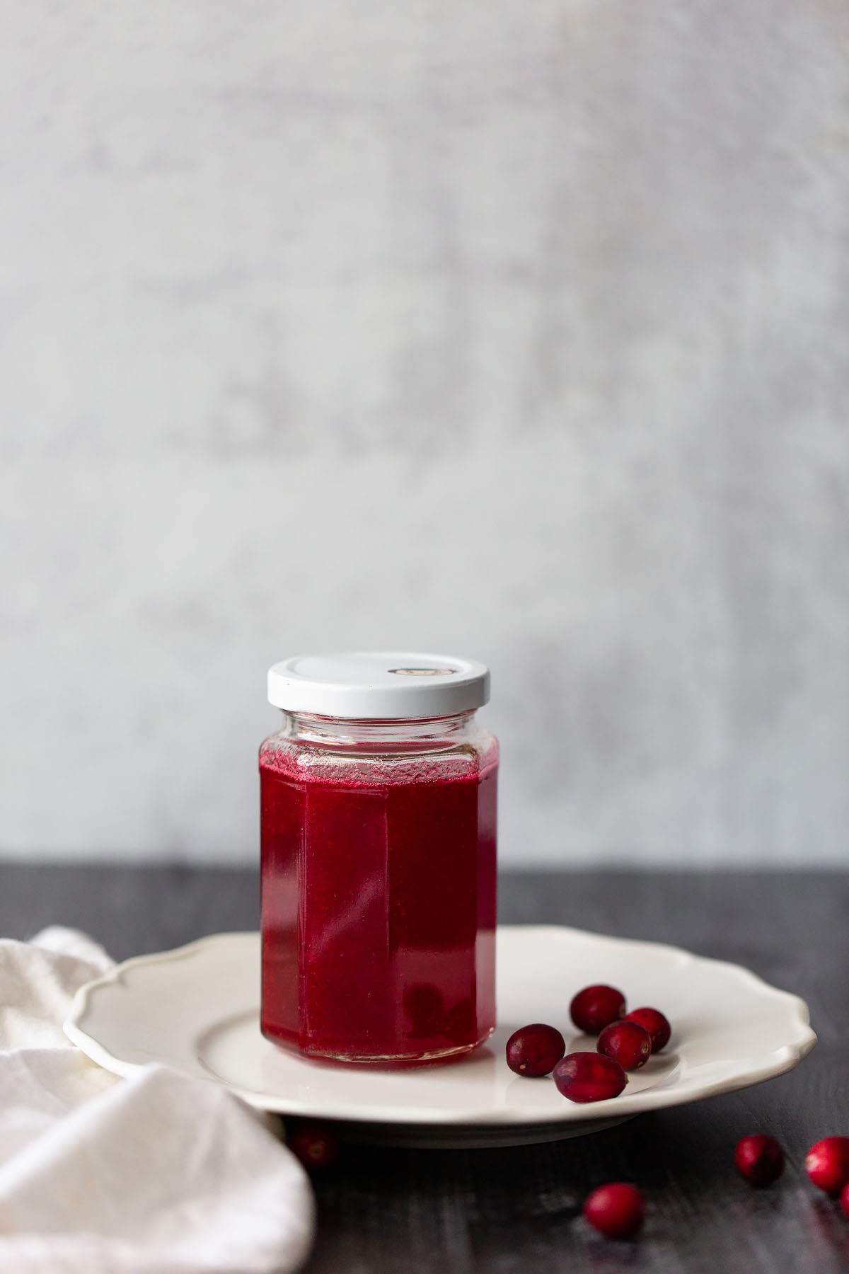 cranberry simple syrup in a jar