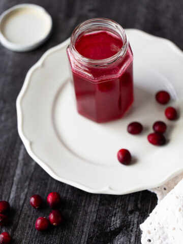 cranberry simple syrup in a jar