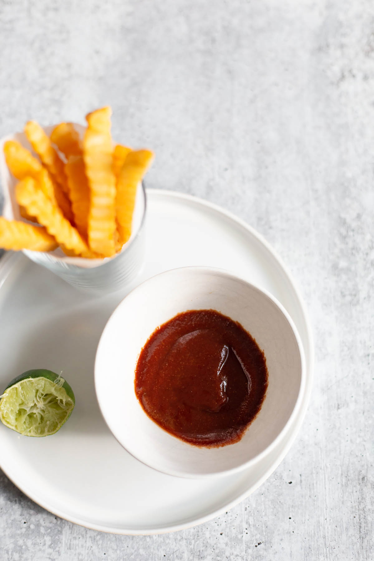 ketchup with cumin and lime served with french fries