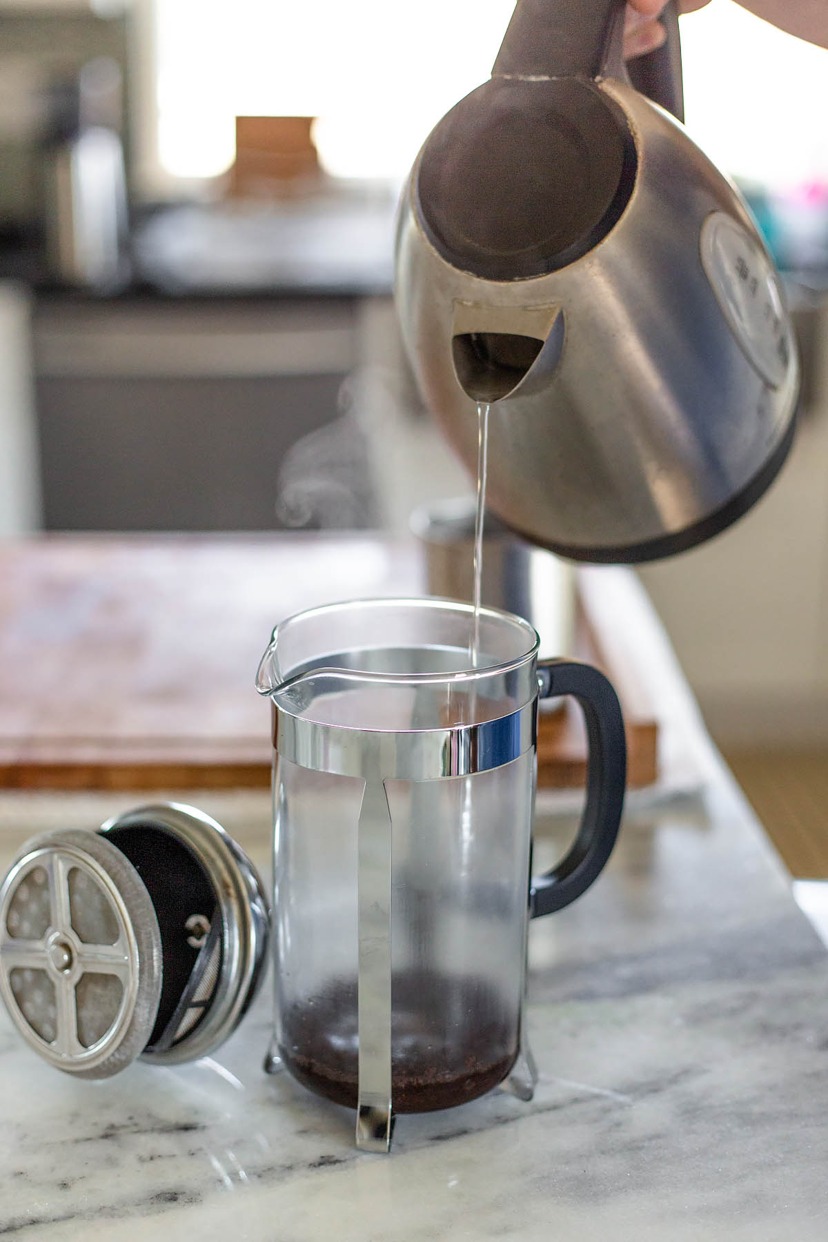 pouring water into a french press