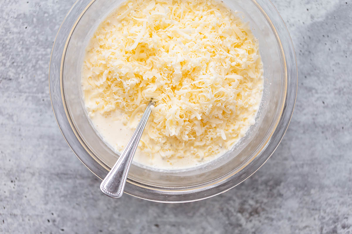 grated cheese with egg and cream