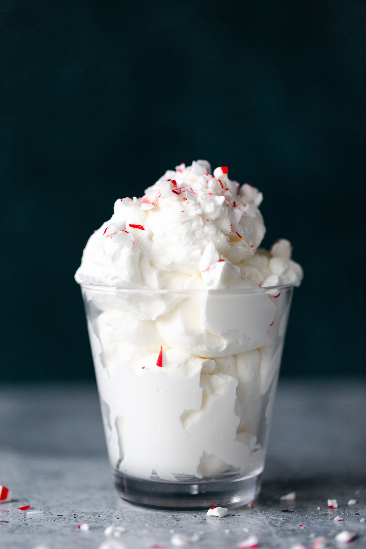 homemade peppermint whipped cream topped with peppermint pieces