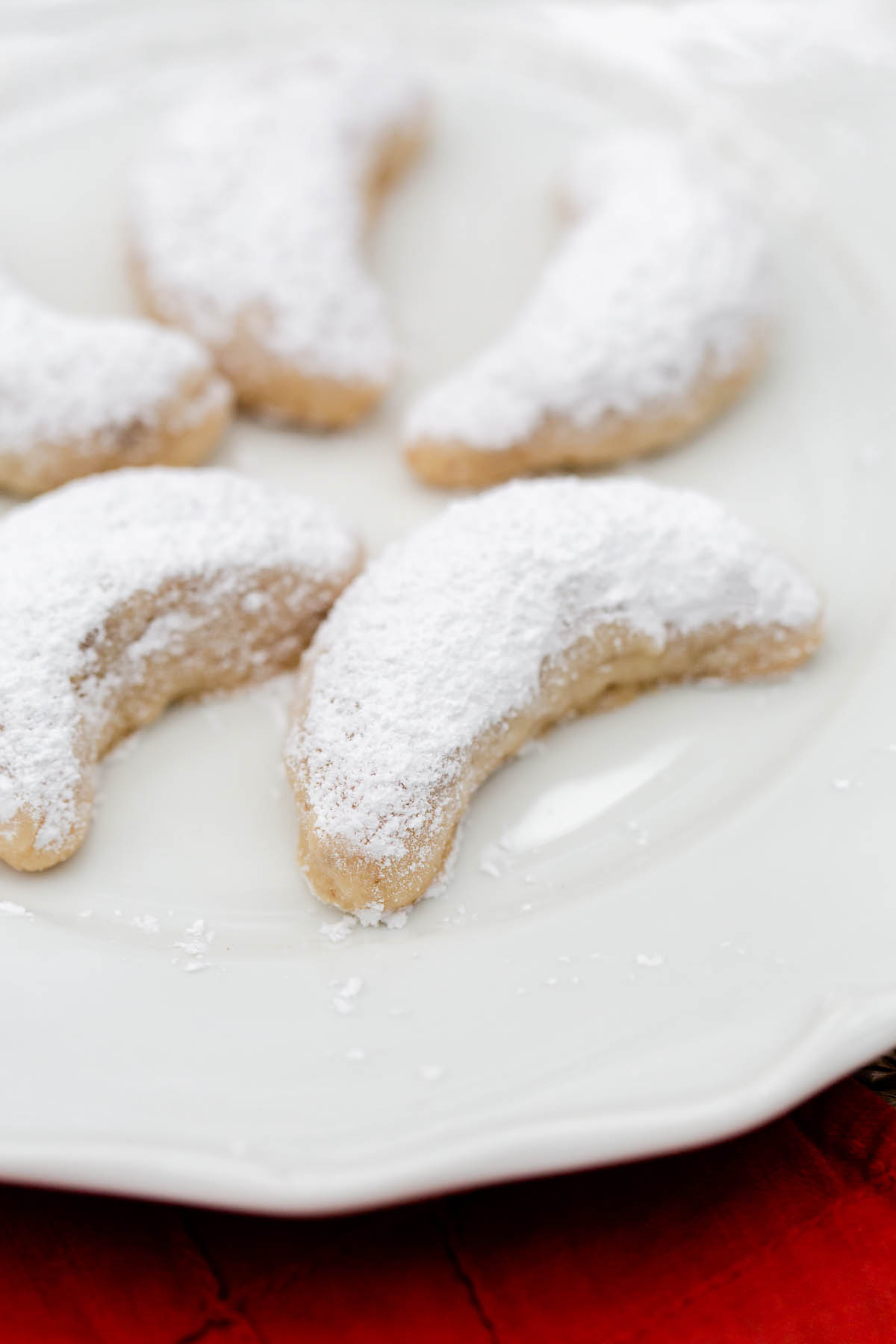 walnut crescent cookies dusted with powdered sugar