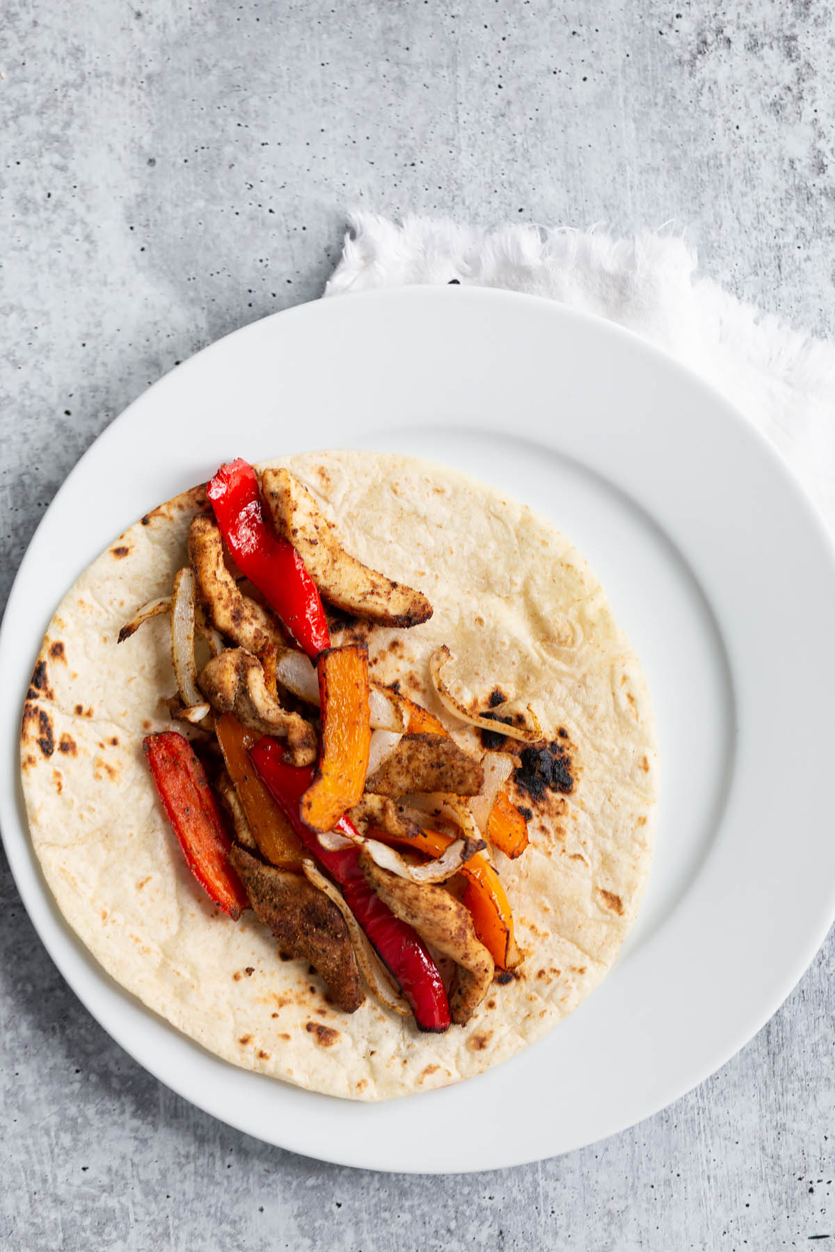chicken fajitas on a tortilla