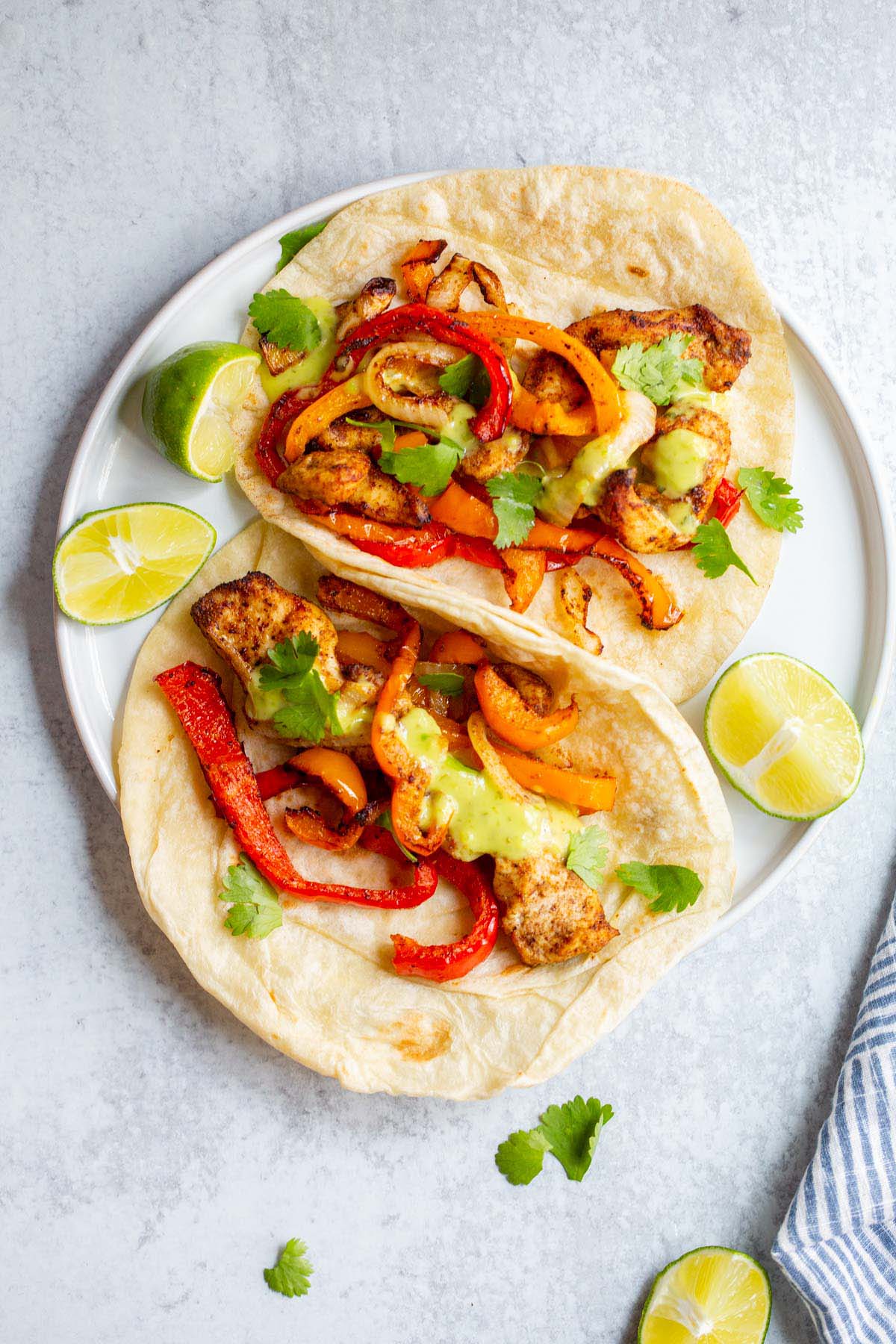 Air fried chicken fajitas on a plate.