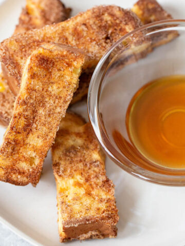 Air fryer french toast sticks with syrup on the side