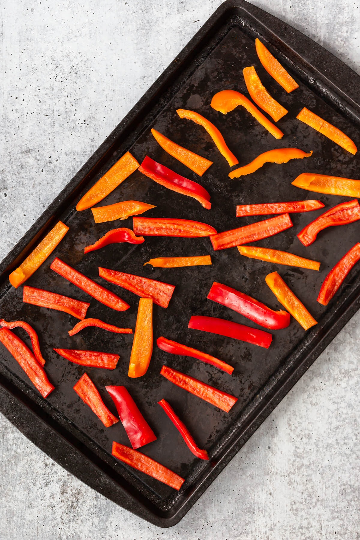 cut bell peppers on a sheet pan