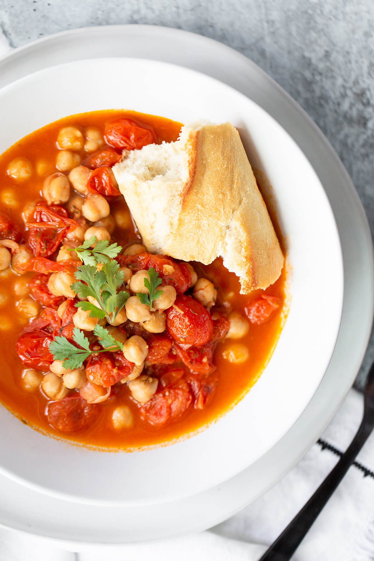 tomato and chickpea stew topped with parsley