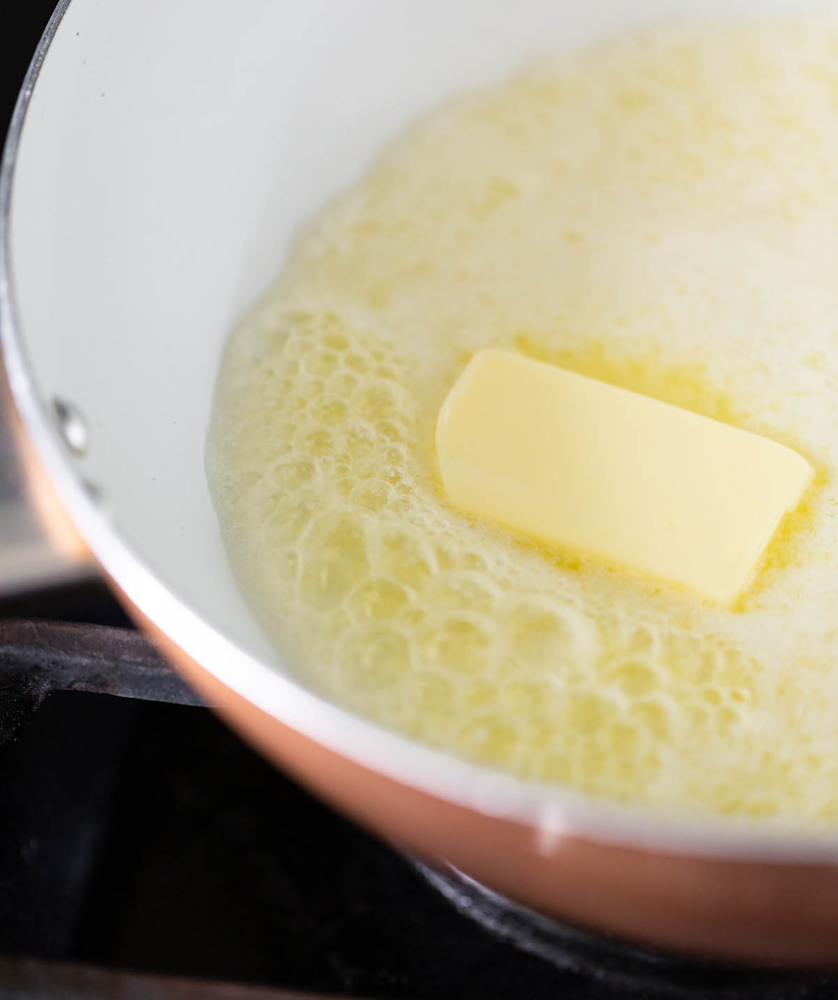 butter cooking in a skillet