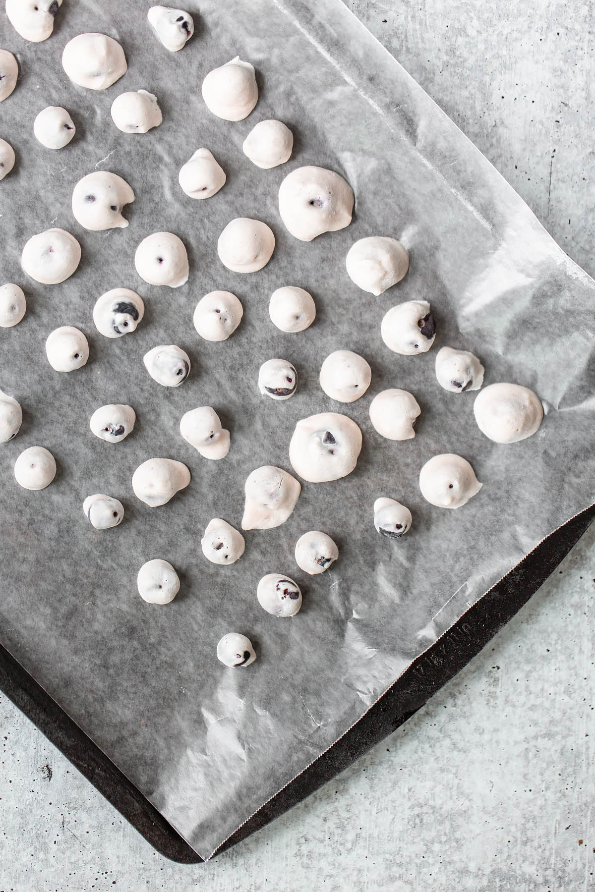 frozen blueberry yogurt bites on a tray