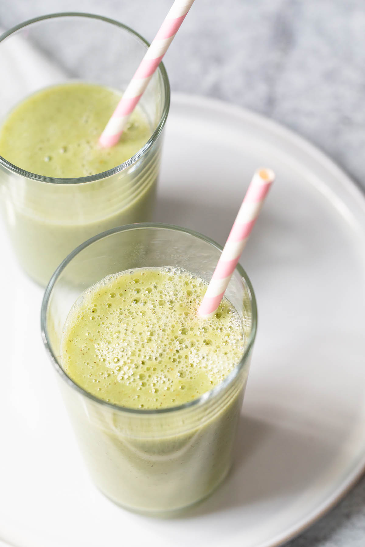 cucumber and kiwi smoothie on a plate