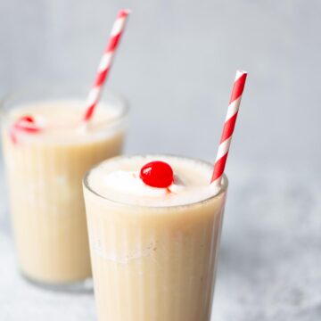 pineapple banana smoothie with a cherry