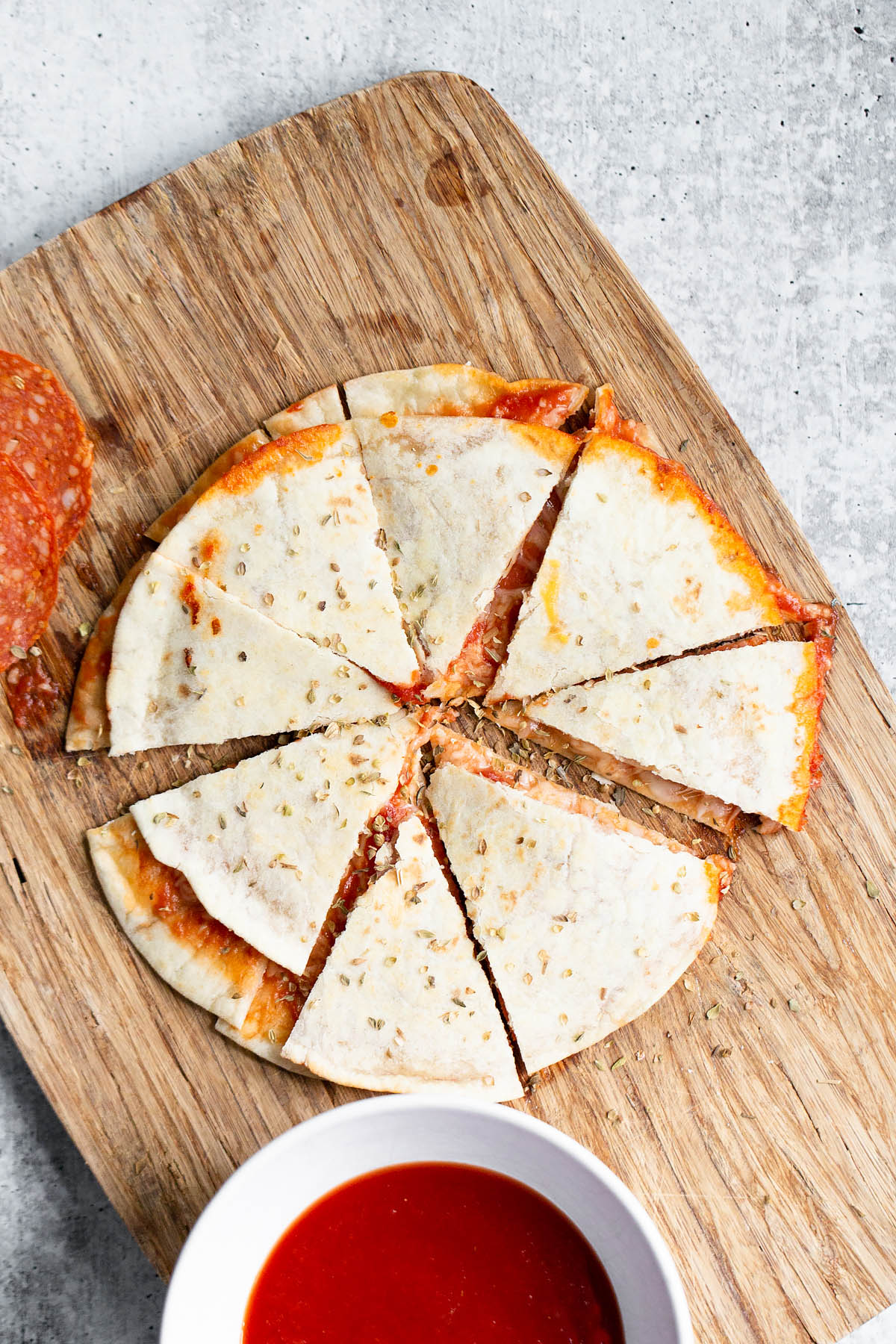 pizza quesadilla on a cutting board