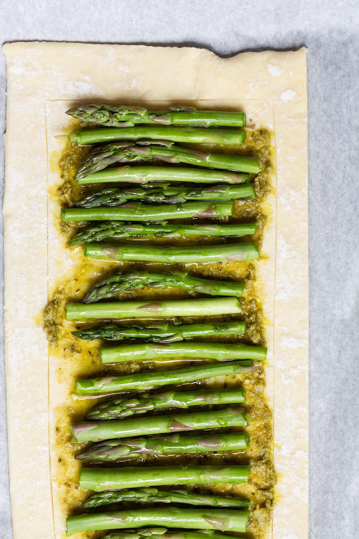 asparagus up close on puff pastry