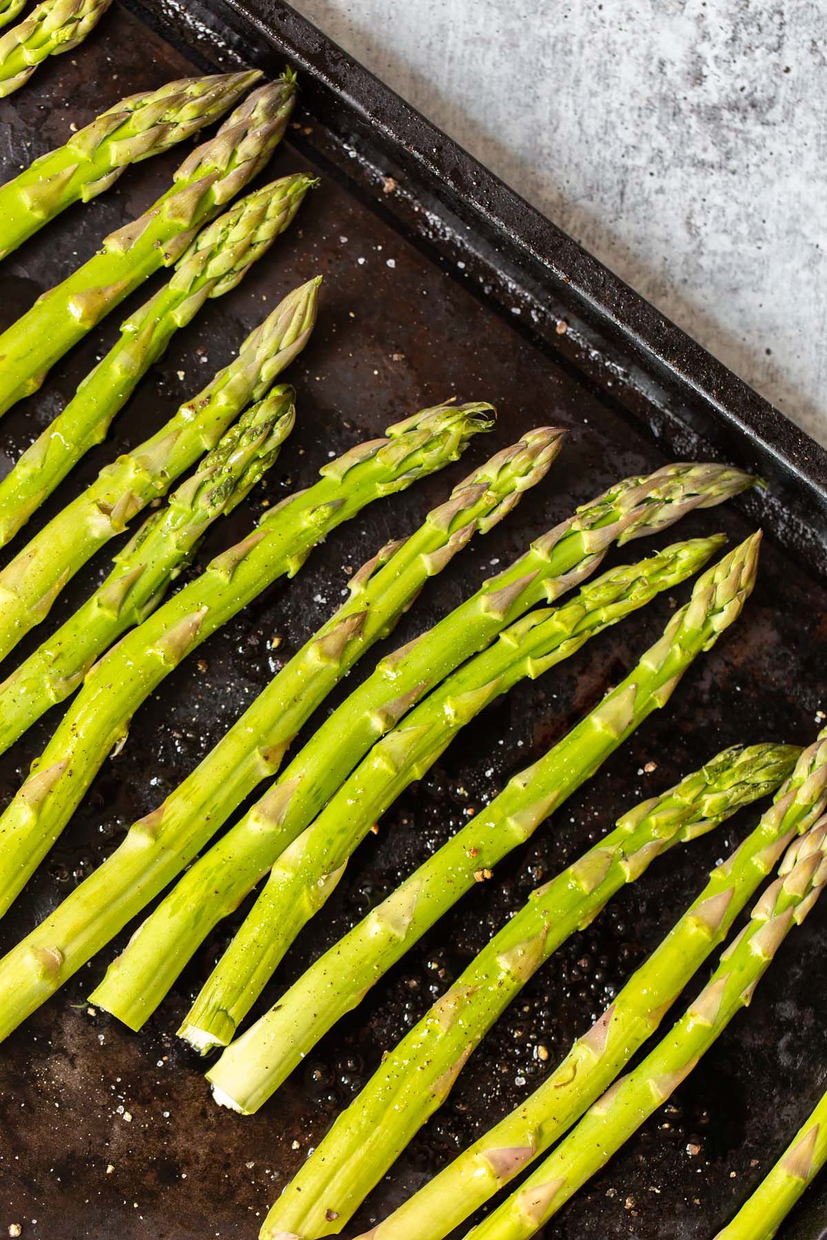 asparagus on a baking sheet