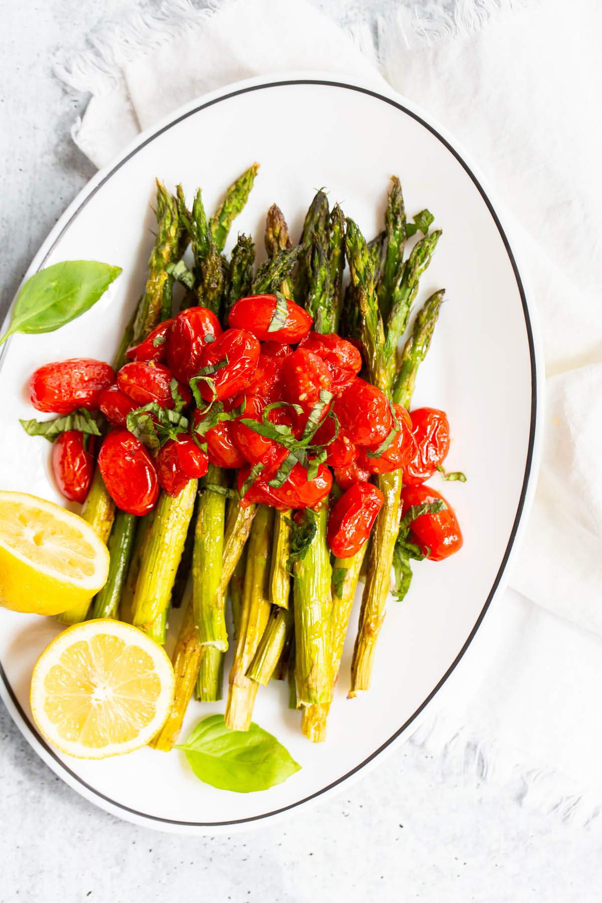 roasted asparagus with cherry tomatoes and lemon