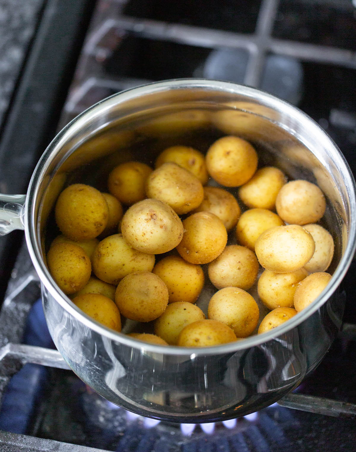 cooking baby potatoes in a pot