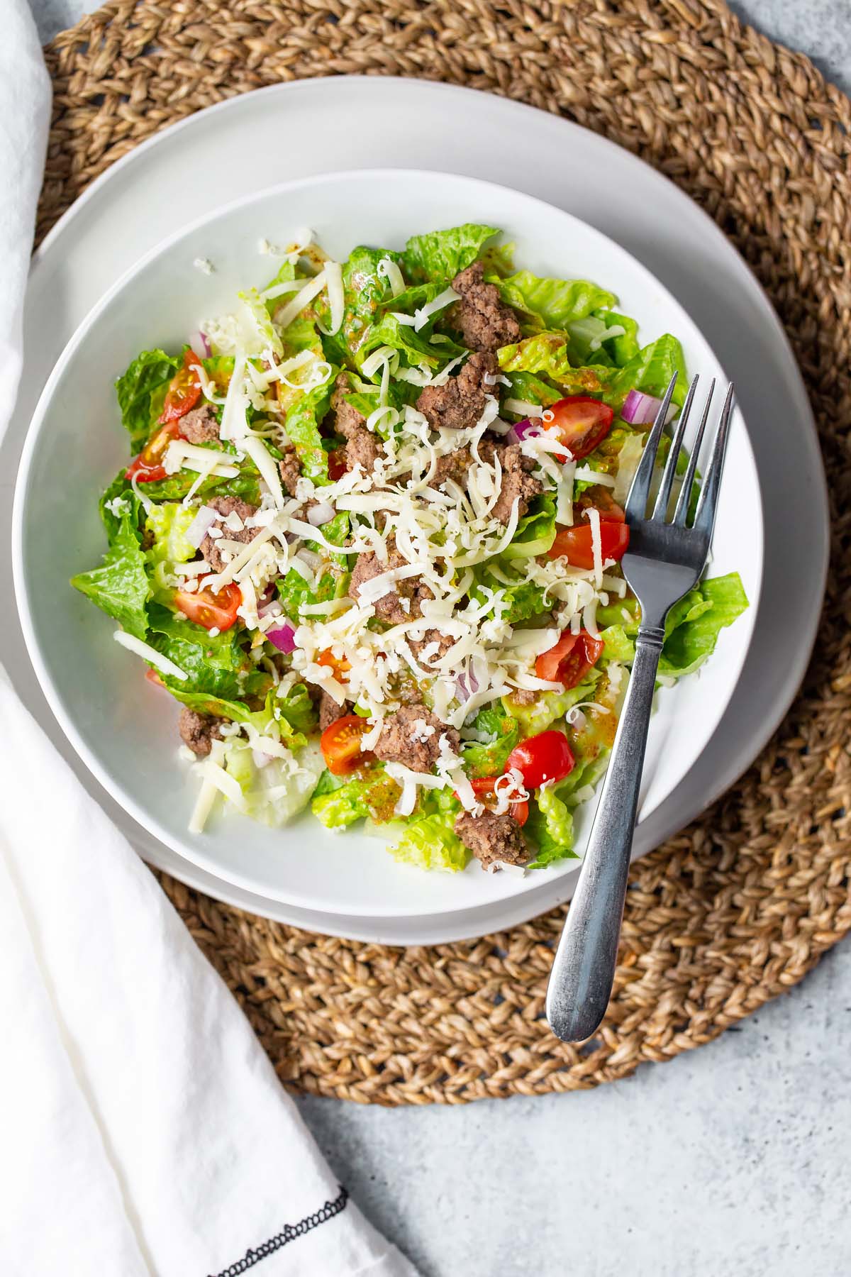 salad on a plate with a fork