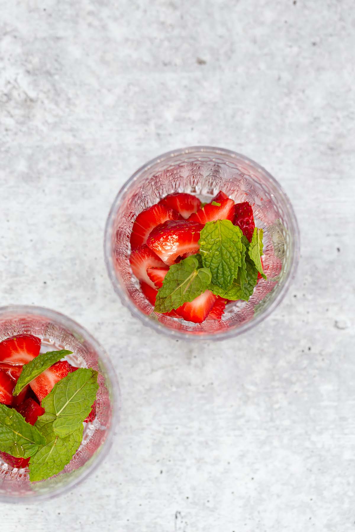 strawberries and mint in glasses